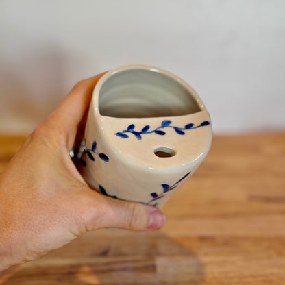 Blue leaf travel cup