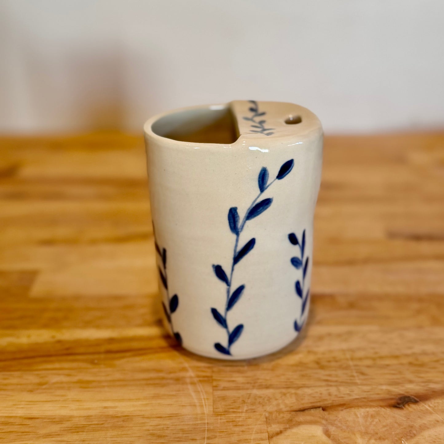 Blue leaf travel cup